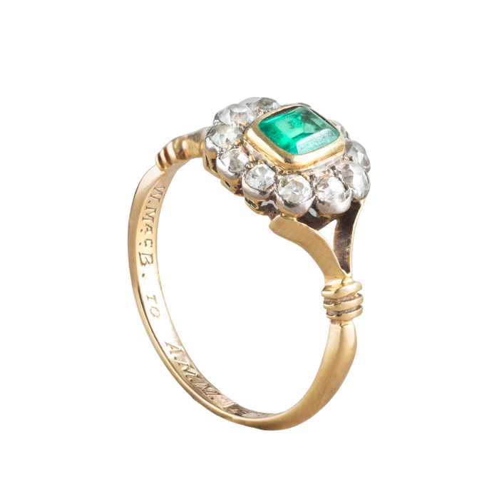 18ct gold antique ring featuring emerald centre and old cut diamond halo