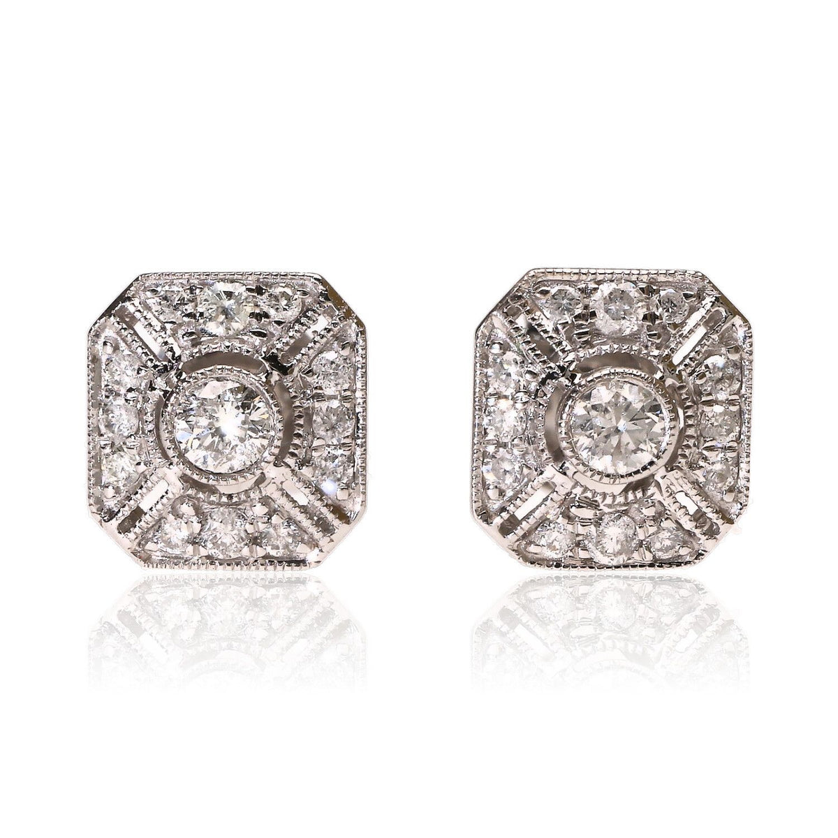 Close-up of art deco revival diamond stud earrings with octagonal 18ct white gold setting.