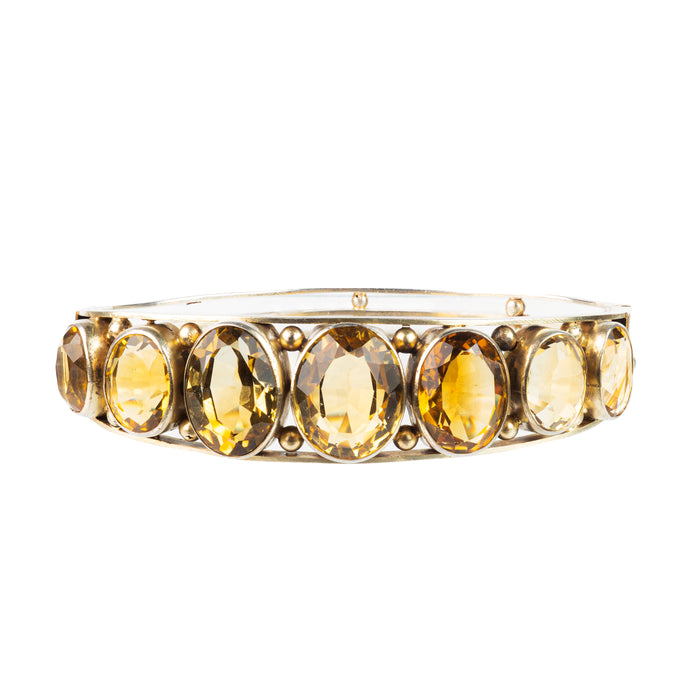 Antique silver bangle set with graduated oval citrines, Edwardian era c.1900–1910