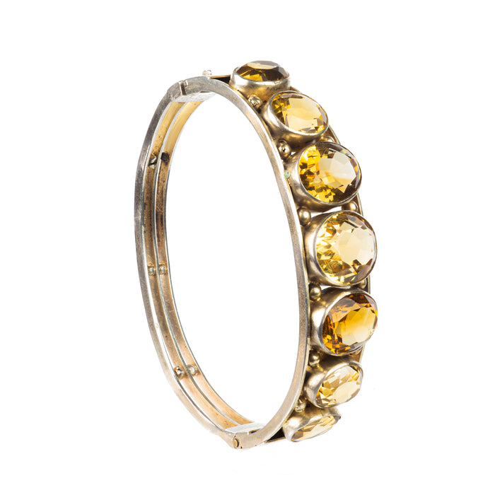 Side view of hinged citrine silver bracelet with bead details and secure clasp, antique jewellery