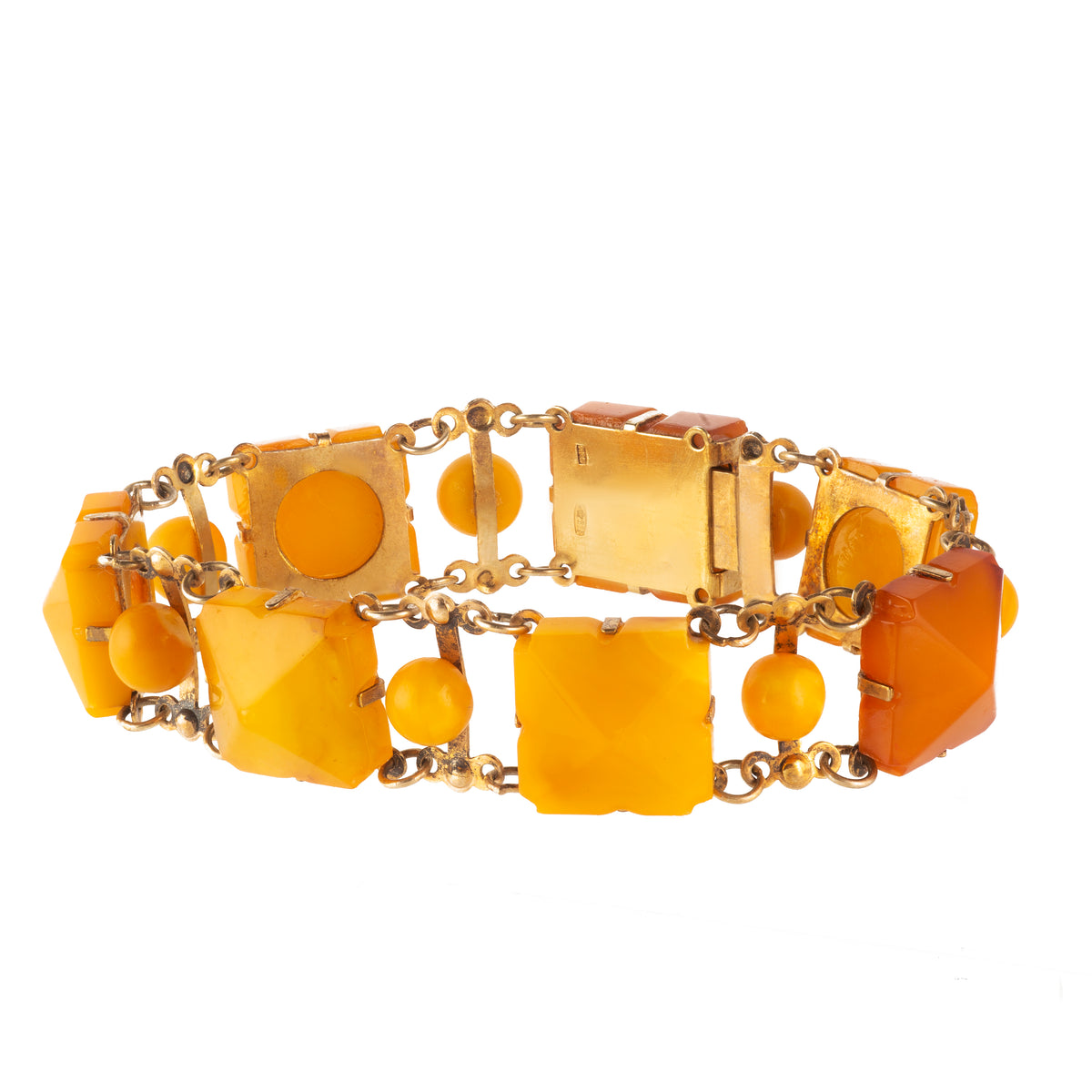Vintage 1960s Baltic amber and 875 silver bracelet from USSR, featuring geometric honey-toned amber stones and double silver chain links.