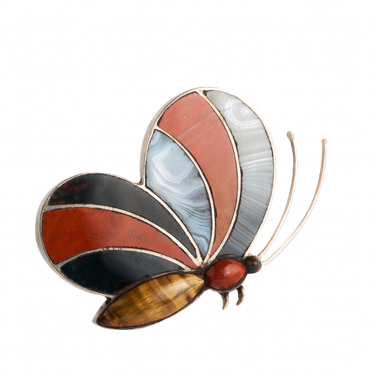 Antique Scottish agate and silver butterfly brooch with intricate stone inlay from the 19th century.