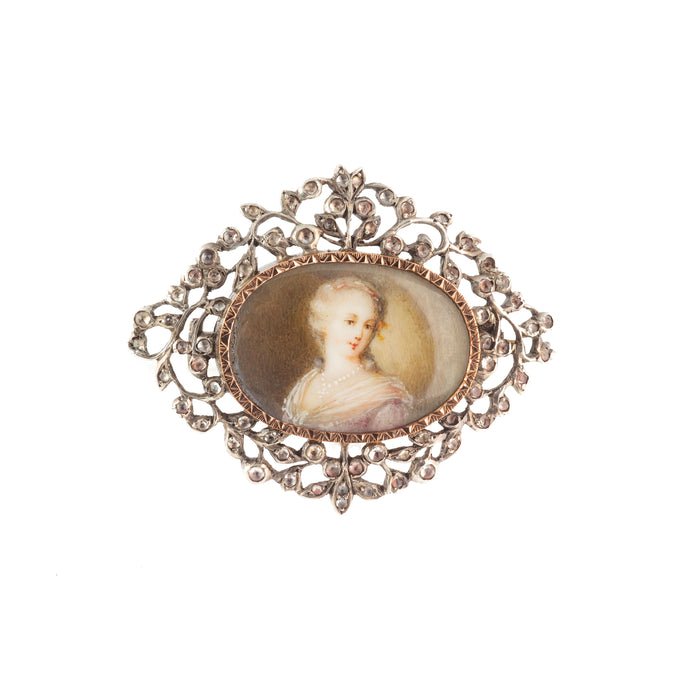 French Rococo portrait miniature brooch, c.1780, set in later Georgian silver and paste mount, c.1800.