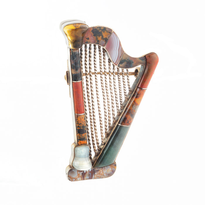 Victorian Scottish silver harp brooch with agate inlay and citrine accent, c.1860, 3.5cm x 6cm.