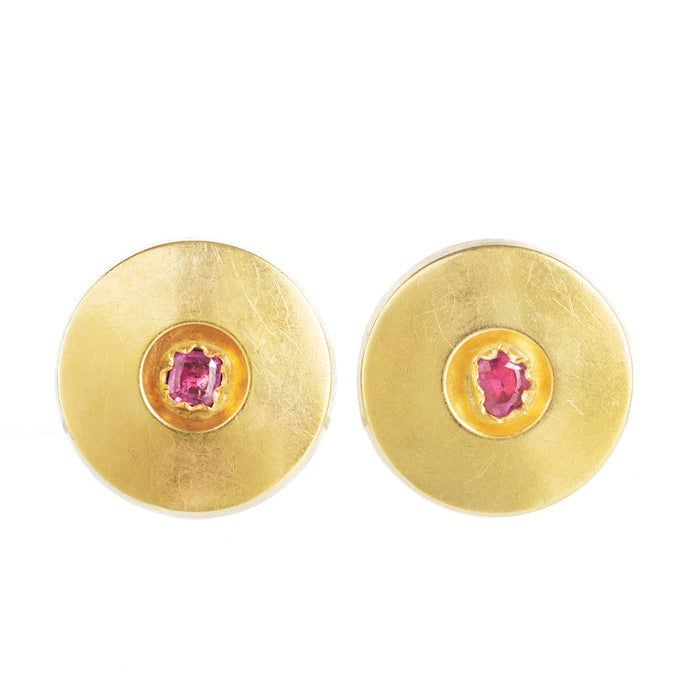Italian 1970s gold disc earrings with vivid rubies in raw bezels