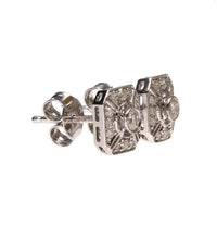 Side view of Art Deco-inspired diamond stud earrings showcasing geometric design.