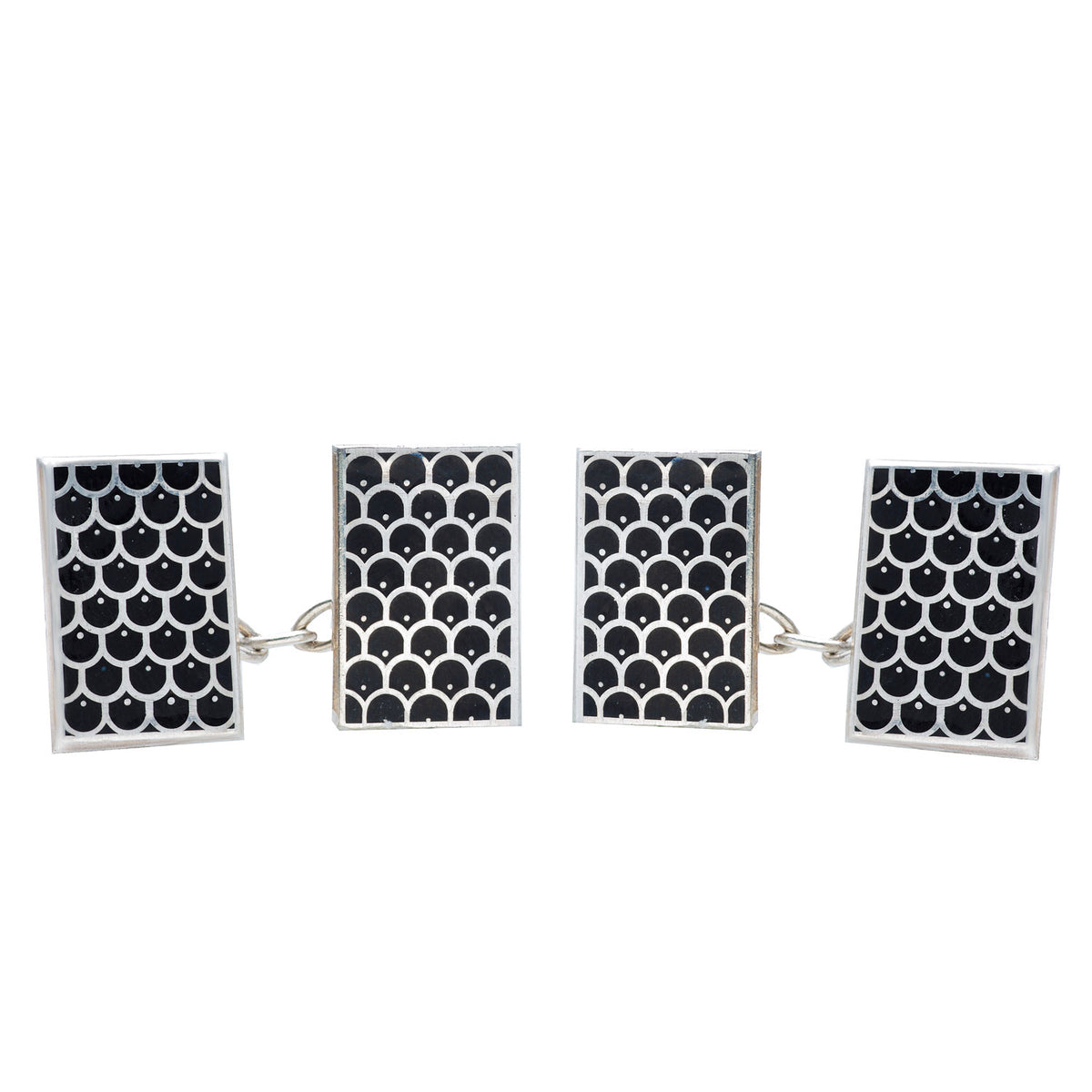 Pair of British silver cufflinks with black enamel scallop pattern, hallmarked Birmingham 1995.
