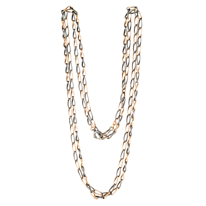 Long antique niello and gilt silver guard chain necklace, 150cm, looped display.