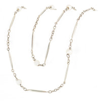 Art Deco pearl chain necklace in gold and platinum, French eagle hallmark, c.1920s.