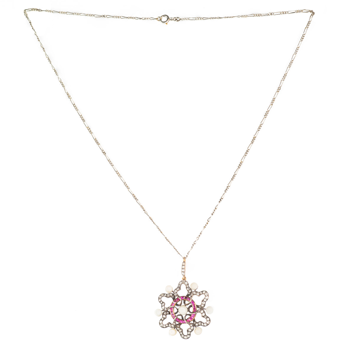 Antique ruby, pearl, and diamond pendant necklace in platinum, floral design, c.1905.