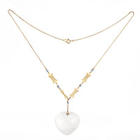 Vintage gold chain necklace with carved rock crystal heart and blue sapphire accents, c.1930s.