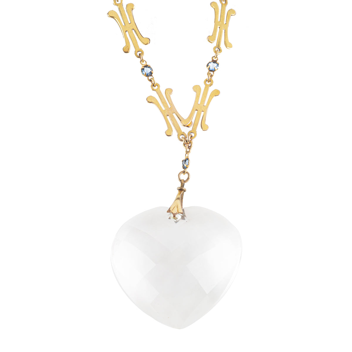 Late 1930s rock crystal heart pendant necklace with 9ct gold chain and sapphires.