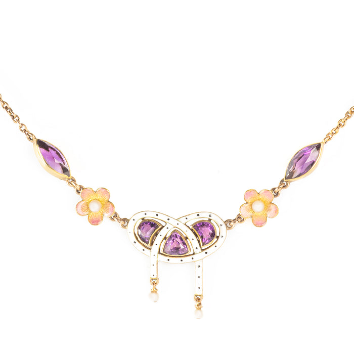 Gold and enamel Edwardian necklace with lover’s knot, pear-shaped amethysts, and enamel flowers, c.1905.