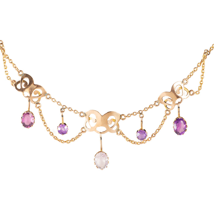 Edwardian gold necklace with scrollwork and amethyst drops, c.1905–1915
