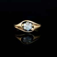 Art Nouveau diamond cluster ring with open gold shoulders