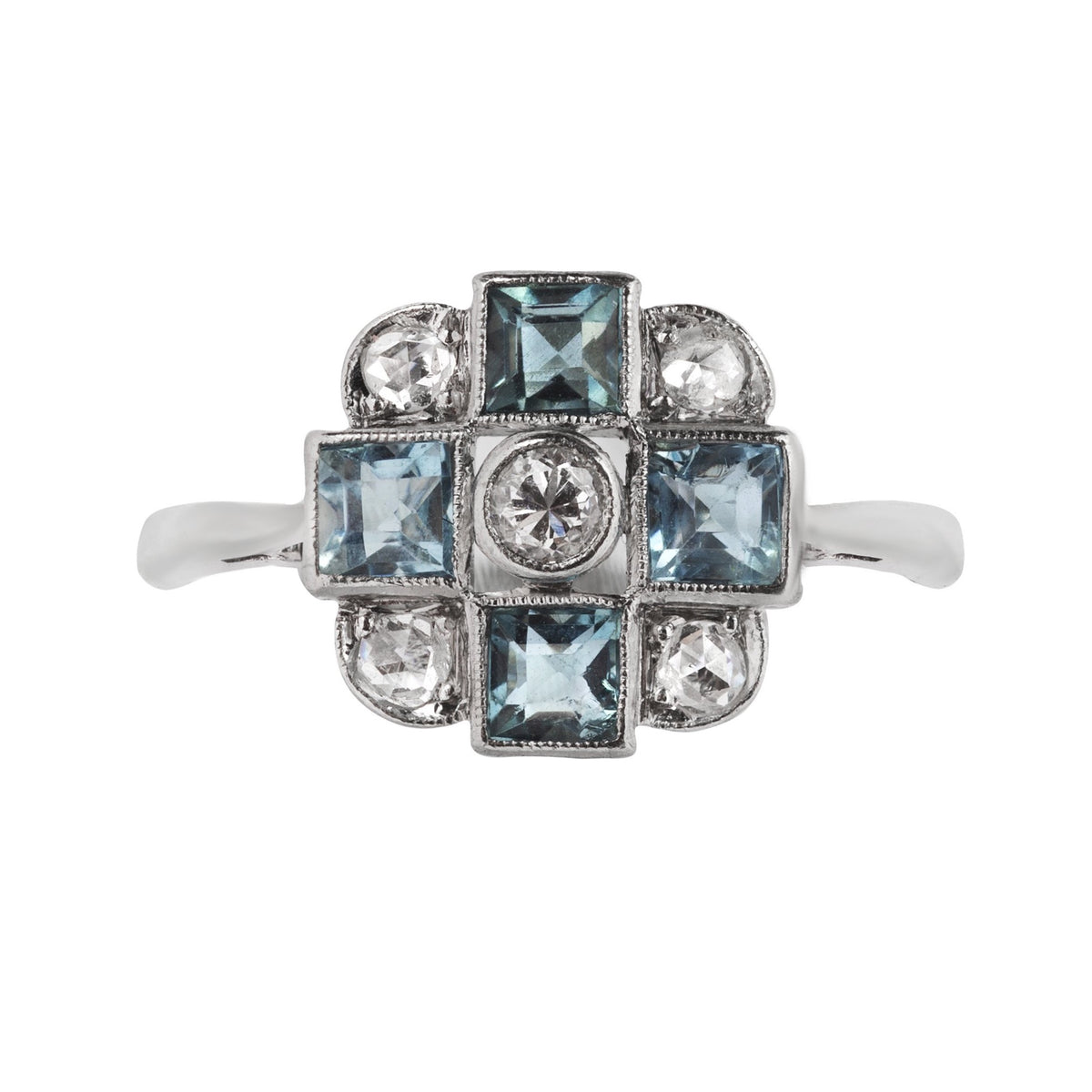 1950s British aquamarine and diamond ring in 18ct gold with platinum cross motif setting