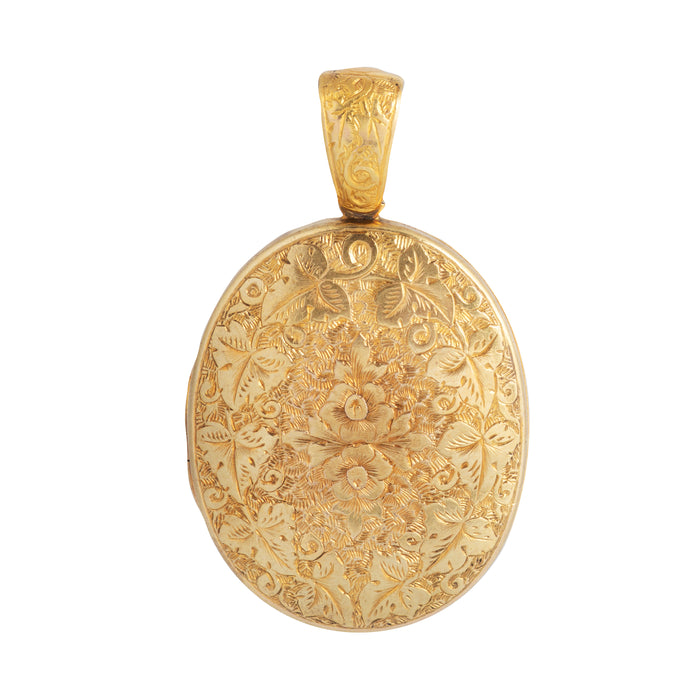 Antique 15ct gold locket with ornate floral engraving from the 1880s