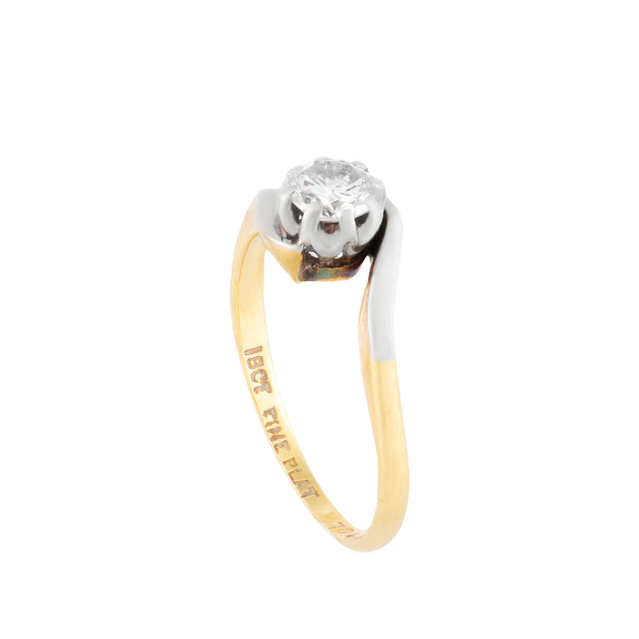 Vintage diamond solitaire ring with 0.50ct old European cut stone in sculptural gold and platinum twist mount
