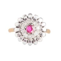 Vintage ruby and diamond cluster ring with scalloped platinum petals, English, 1950s