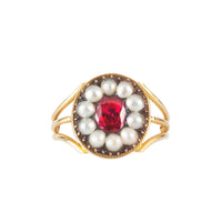 Victorian 1890s ring featuring a central Burma ruby surrounded by natural pearls, set in 18ct gold with an etched triple-band shank.