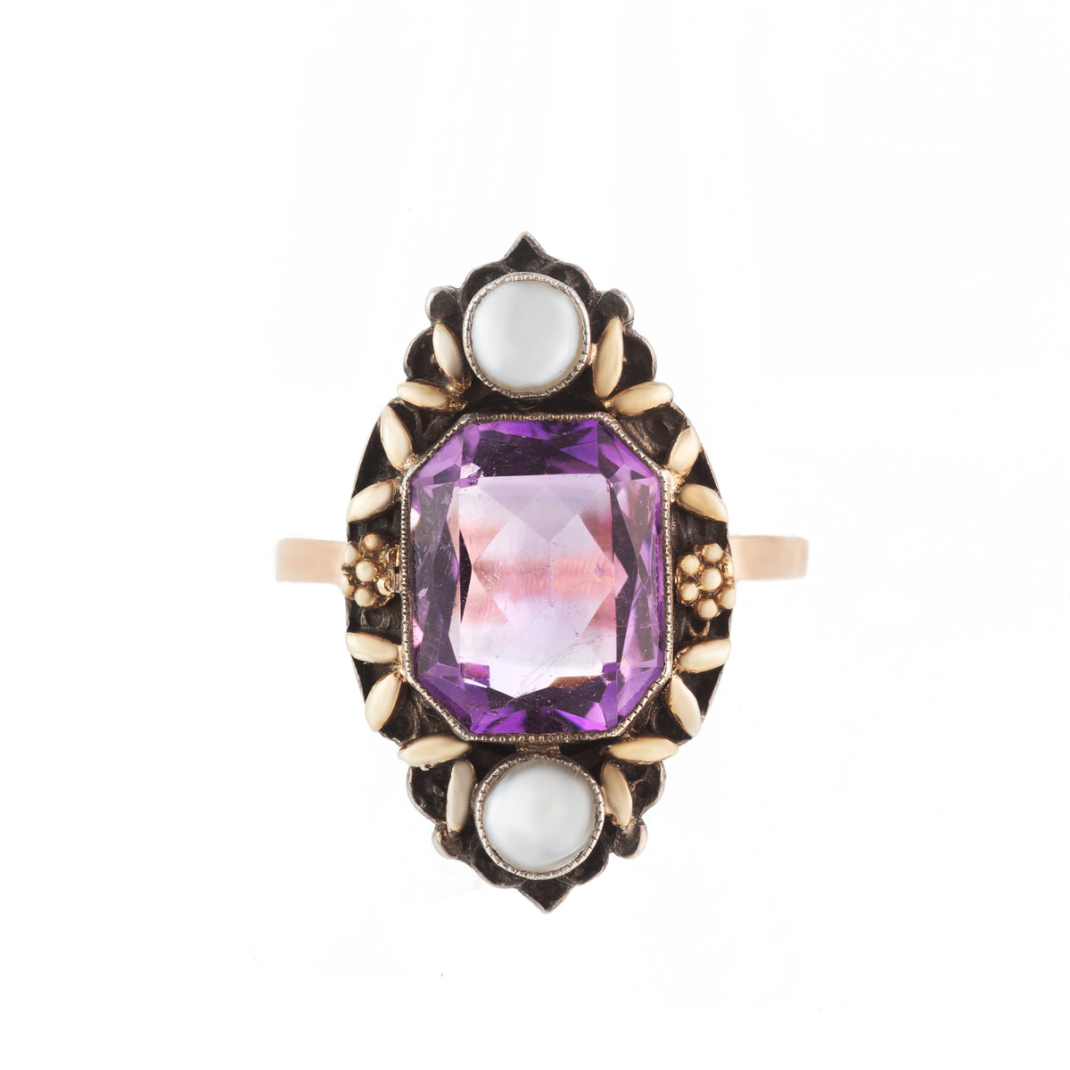Arts and Crafts ring with large amethyst and natural pearls, set in hand-worked gold and silver, attributed to Arthur & Georgie Gaskin, c.1915.