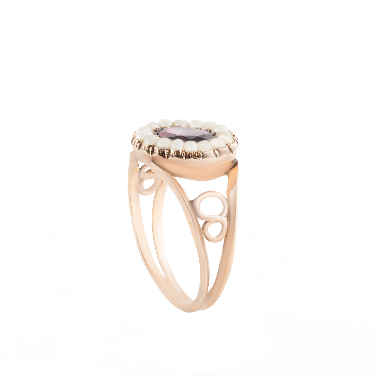 Antique Georgian garnet and pearl ring in 9ct gold, romantic and symbolic early 19th-century design.