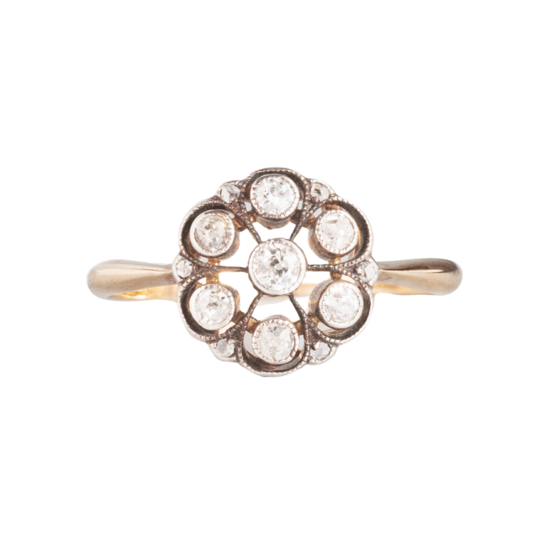 Victorian diamond cluster ring with radiating openwork design in 18ct gold