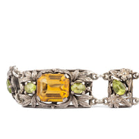 Bernard Instone 1930s silver bracelet featuring leaf and flower motifs with gemstones