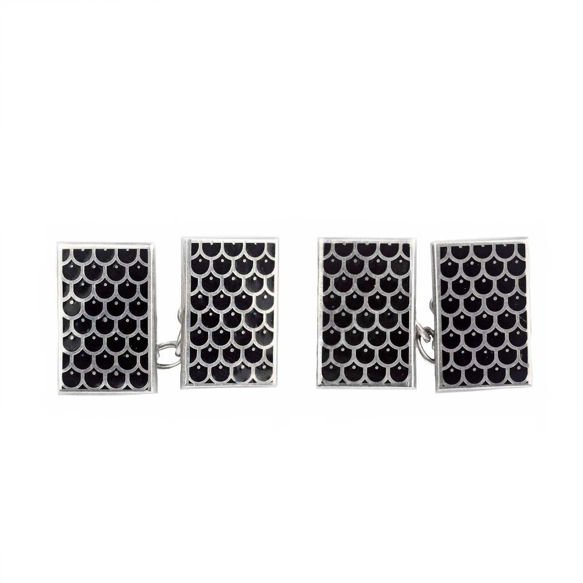 Rectangular 1990s silver cufflinks featuring repeating honeycomb enamel design on black ground.