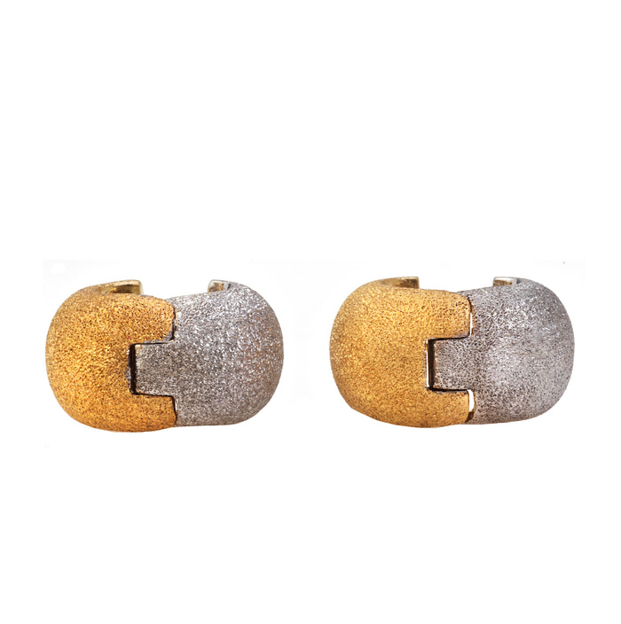 Vintage Italian earrings in two-tone textured gold with sculptural hoop form