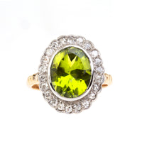 Edwardian peridot and diamond ring in 18ct gold and platinum, English, c.1910.