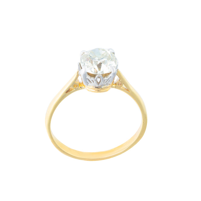 Vintage 1930s engagement ring featuring an old cut diamond in yellow gold and platinum setting
