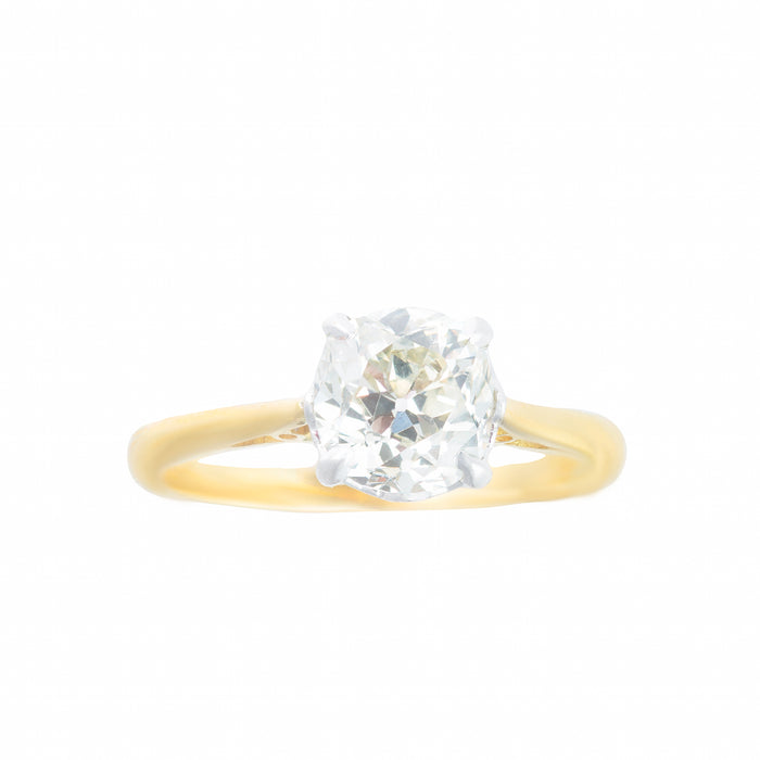 1930s single stone diamond ring in 18ct gold and platinum with a 1.55ct old cushion cut diamond