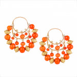 A Pair of Gold Coral Hoop Earrings