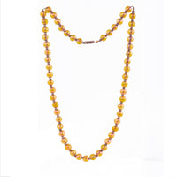 1920s iridescent glass bead necklace by Württembergische Metallwarenfabrik, 6mm beads with warm shimmering tones