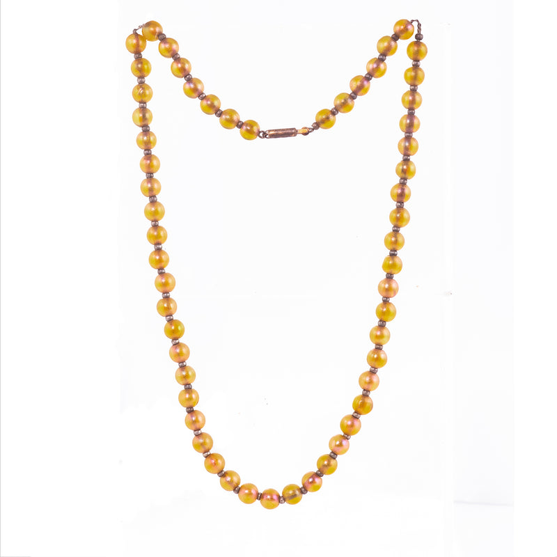 1920s iridescent glass bead necklace by Württembergische Metallwarenfabrik, 6mm beads with warm shimmering tones