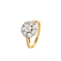 18ct gold diamond cluster ring with floral design, featuring bright round cut diamonds, c.1970s.