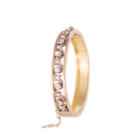 1880s French Belle Époque gold bracelet set with moonstones and diamonds, side view