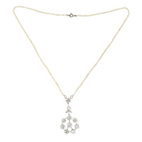 Diamond floral pendant on pearl strand, approx. 5.5ct