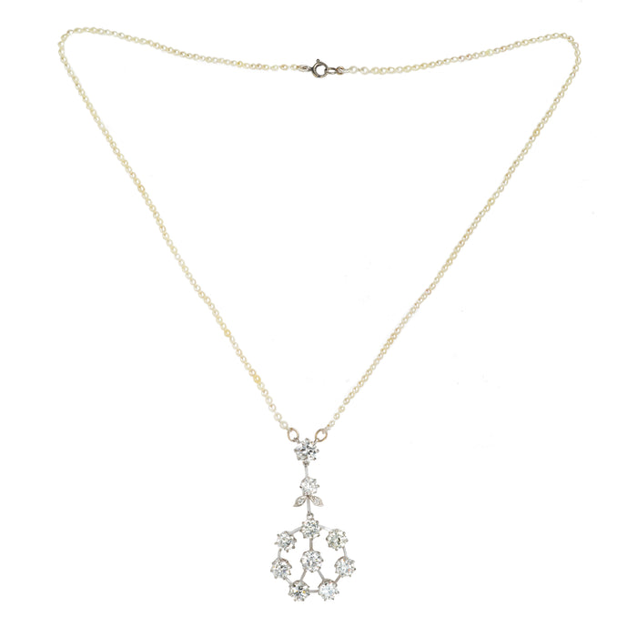 Diamond floral pendant on pearl strand, approx. 5.5ct