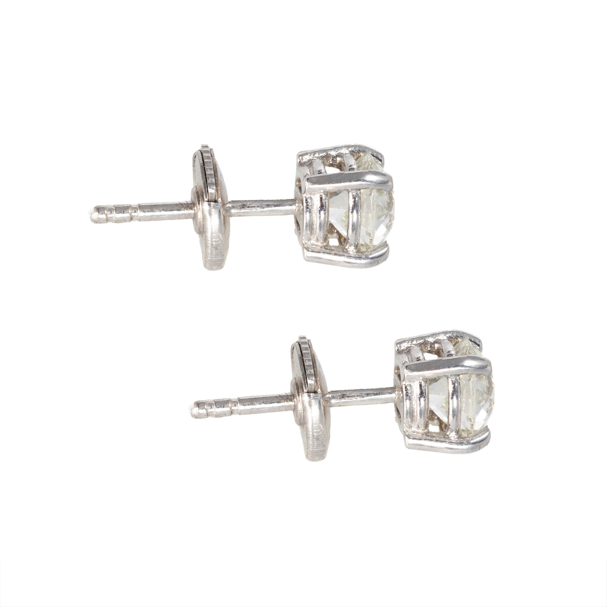 Refined diamond stud earrings in platinum, E L T O N S Mayfair