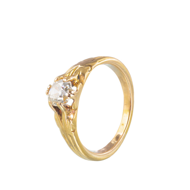 Vintage 1920s gold engagement ring feauring cushion-cut diamond.