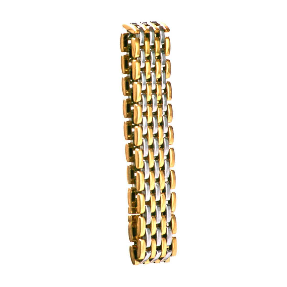 Side profile of vintage Cartier bracelet showing polished gold and steel rows and bracelet’s structured depth.