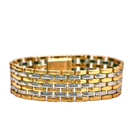 Cartier Maillon Panthère bracelet with seven rows of 18ct gold and stainless steel links, 1980s.