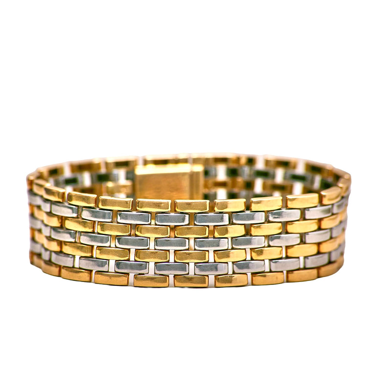 Cartier Maillon Panthère bracelet with seven rows of 18ct gold and stainless steel links, 1980s.