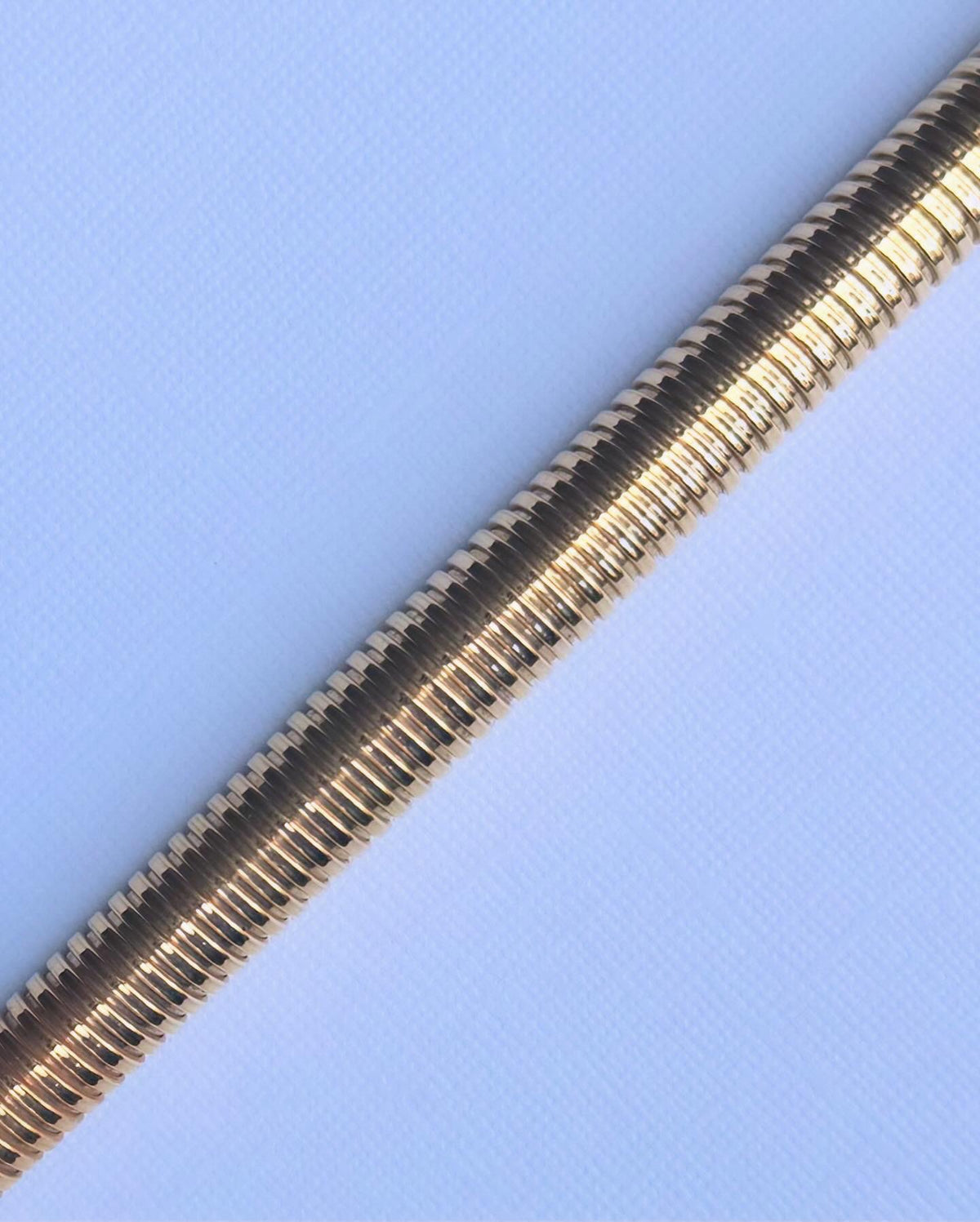 Detail of Tubogas necklace’s coiled gold structure, 18ct yellow gold finish
