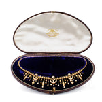 An Edwardian Gold Pearl Necklace