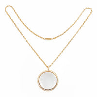 1830s English magnifying pendant with clear crystal lens and pearl border