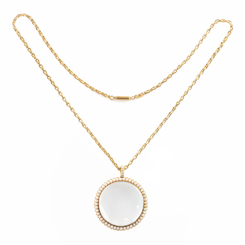 1830s English magnifying pendant with clear crystal lens and pearl border
