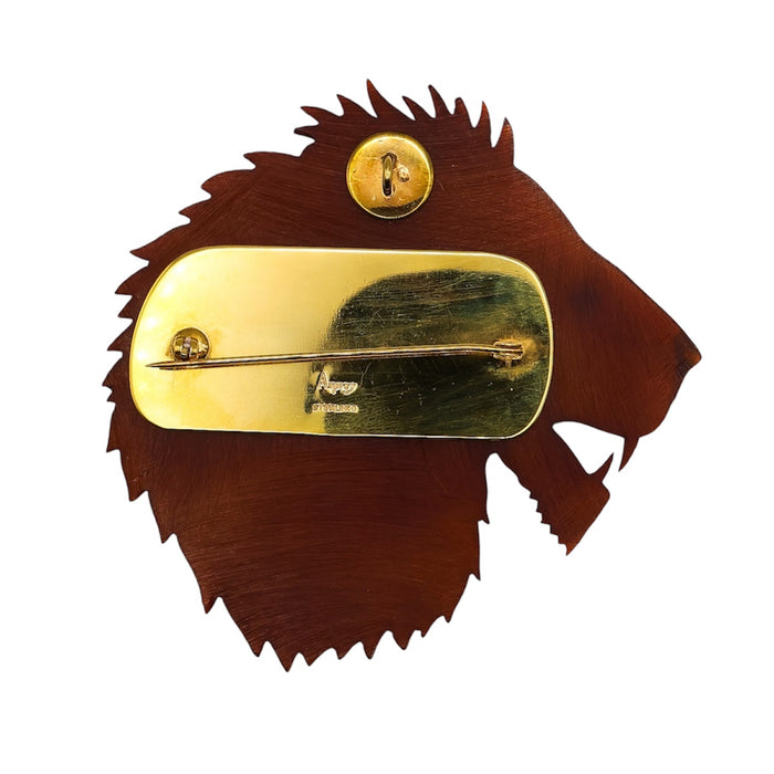 Close-up of back of Deco Bakelite lion head brooch by Asprey London